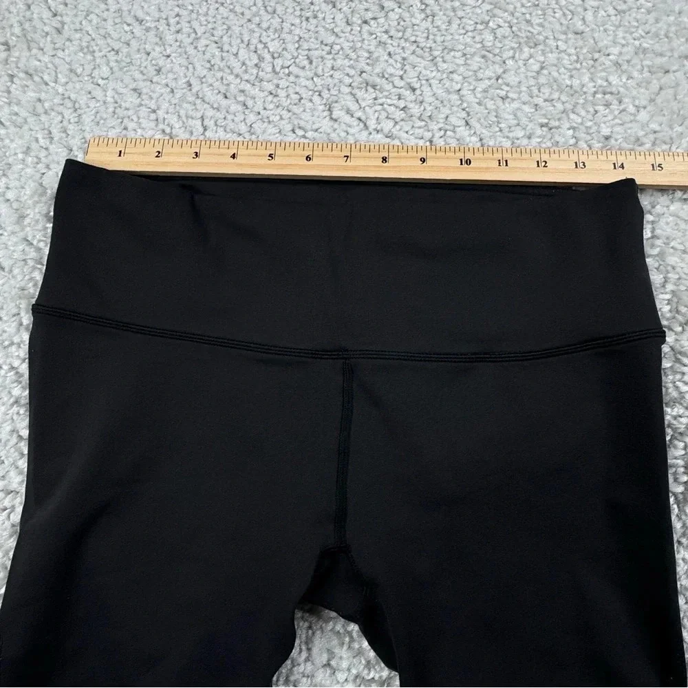 Lululemon Reveal Crop in Black. Mesh Sides. Size 12 or XL